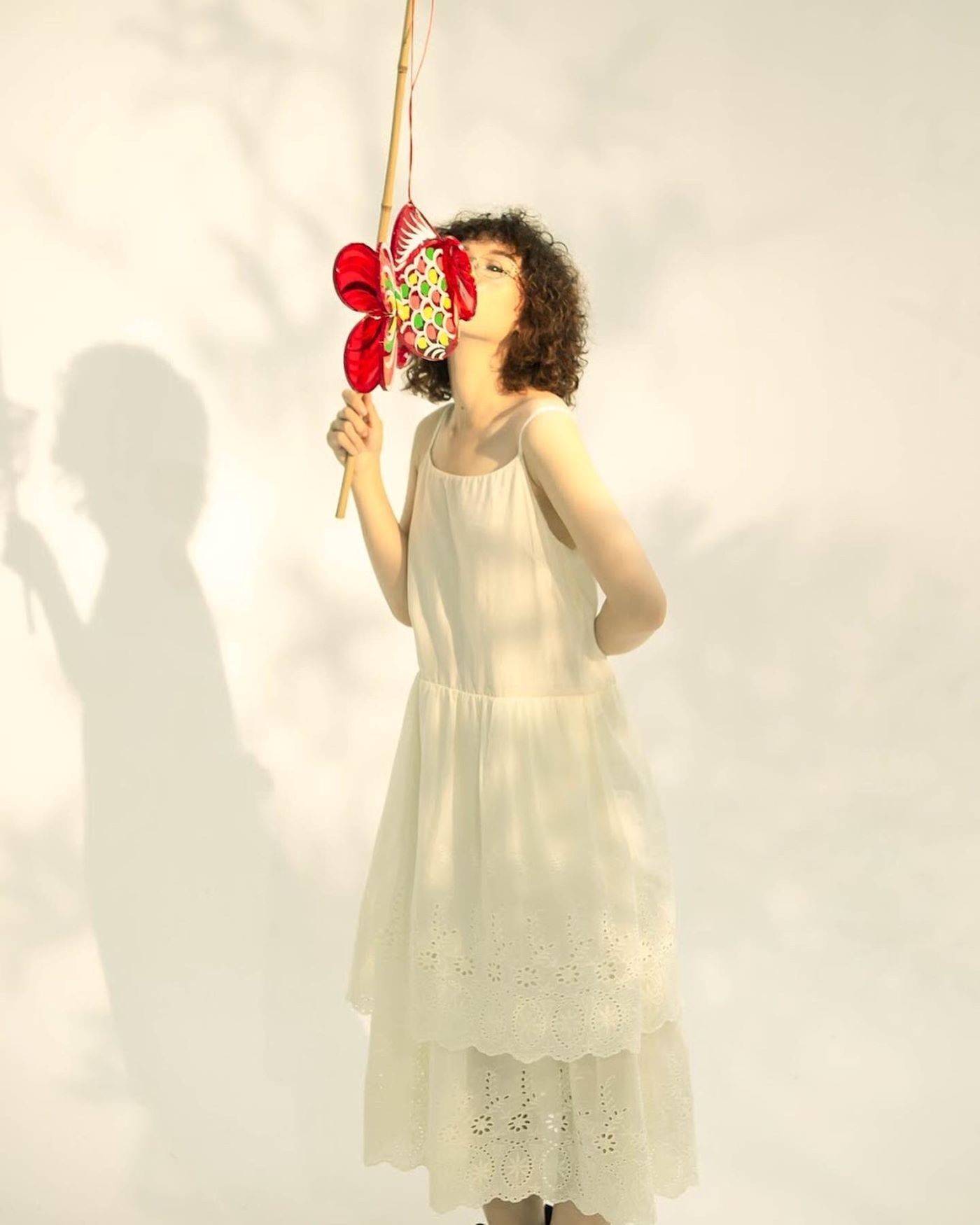 Mái tóc xù gắn với cái duyên làm nghề mẫu của nàng thơ Tina Dương